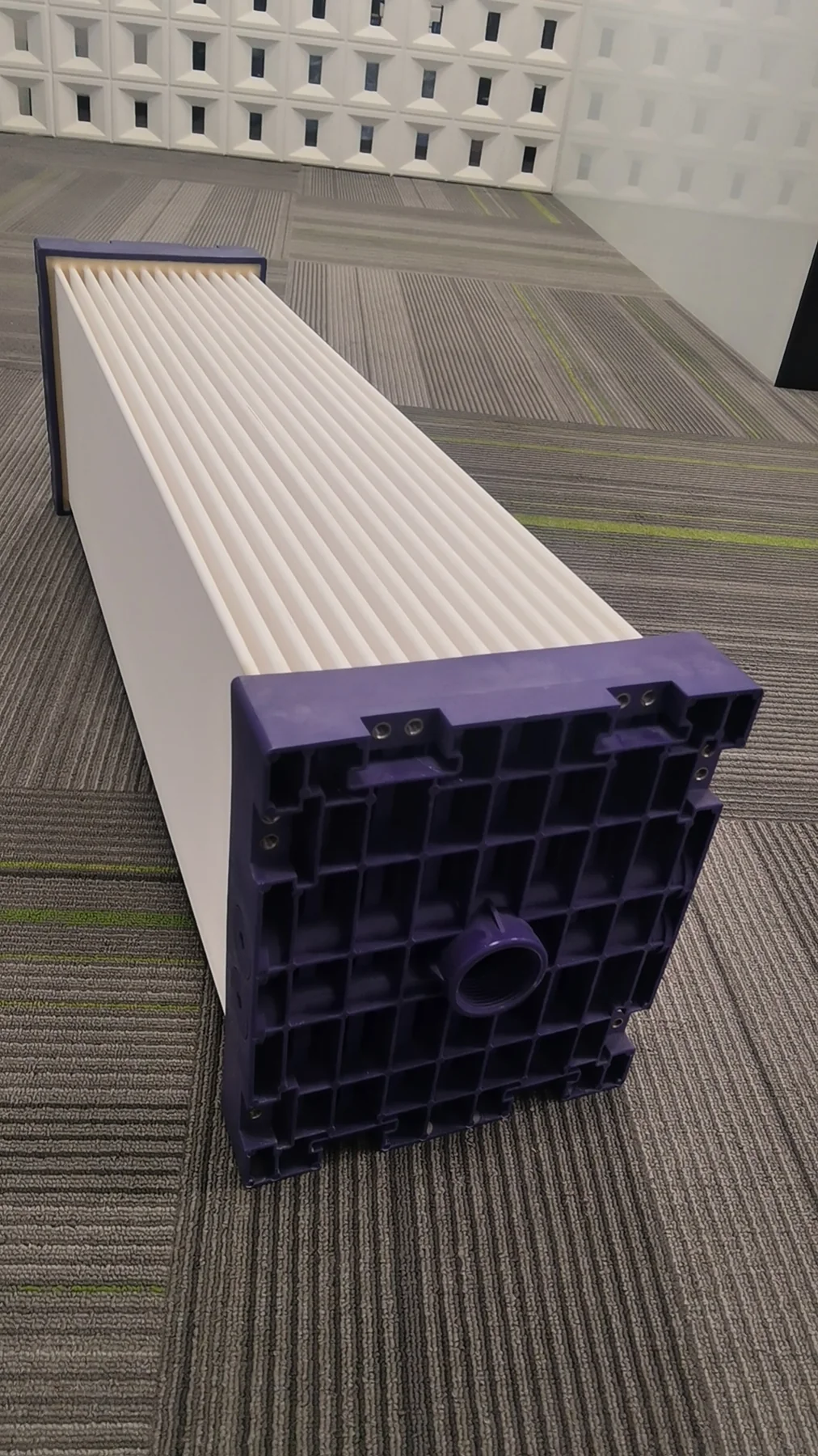 Ceramic flat sheet membrane module with white ceramic plates and purple end frame