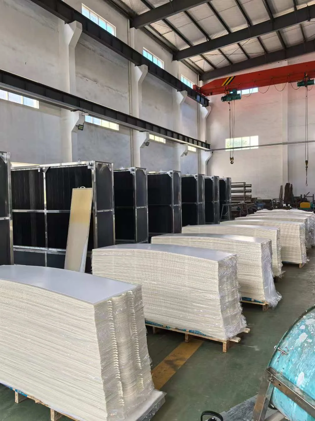 Flat sheet MBR membrane elements prepared for packing in a factory