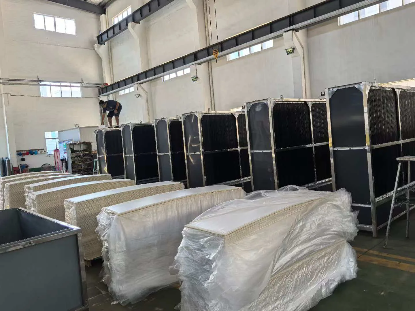 Flat sheet MBR membrane elements and cassette frames during factory assembly
