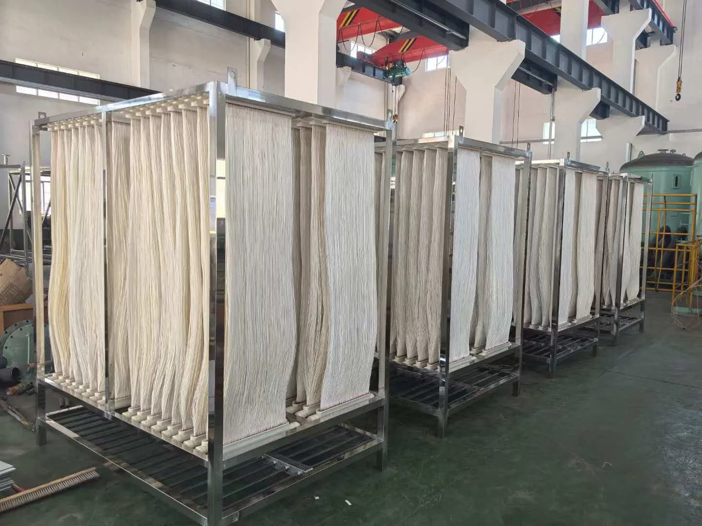 Hollow fiber MBR membrane modules assembled in a factory